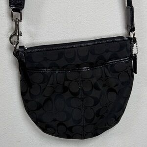 (X4) Coach crossbody bag with black and silver hardware,canvas and leather logo